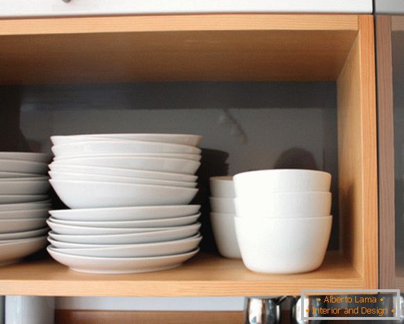 White plates on an open shelf