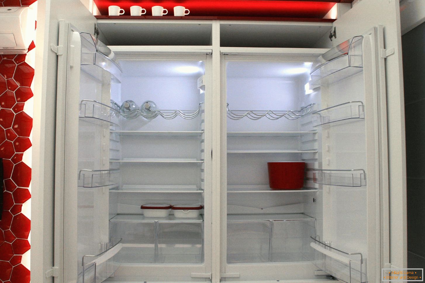 Modern refrigerator in the interior of the kitchen