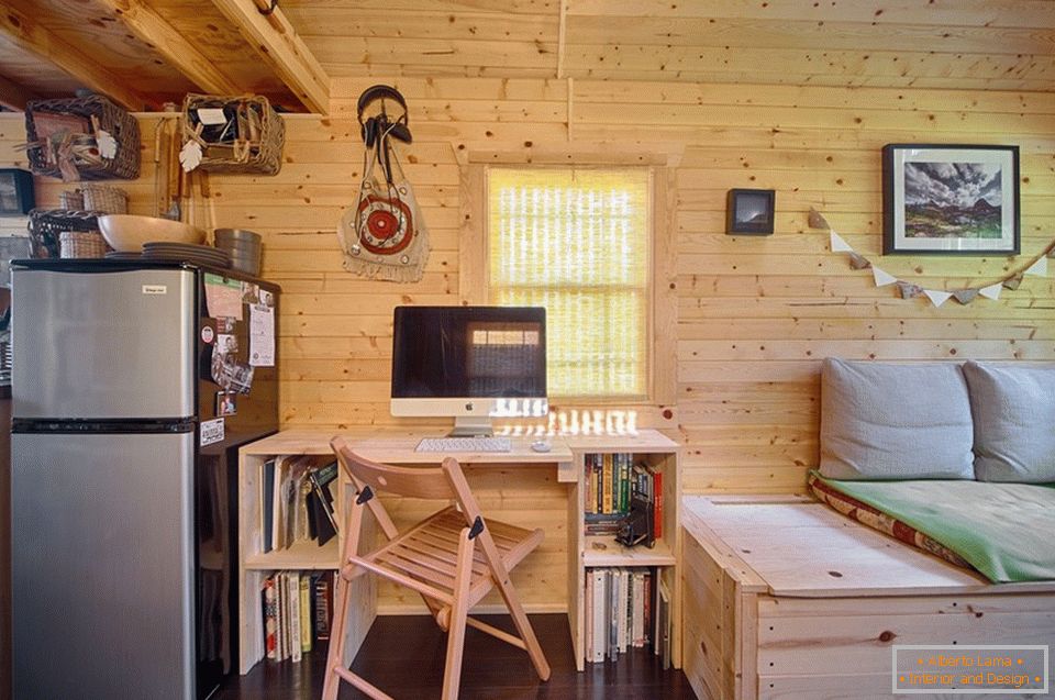 Working area of ​​a small wooden cottage