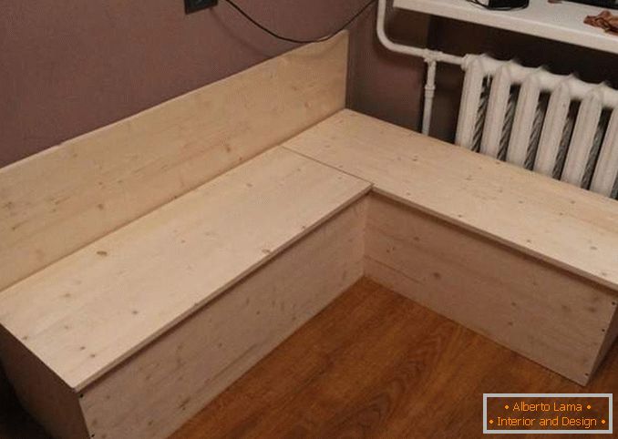 Corner sofa in the kitchen with their own hands made of wood with storage boxes