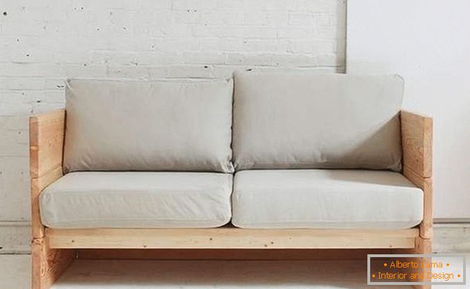 Small wooden sofa with your hands at home