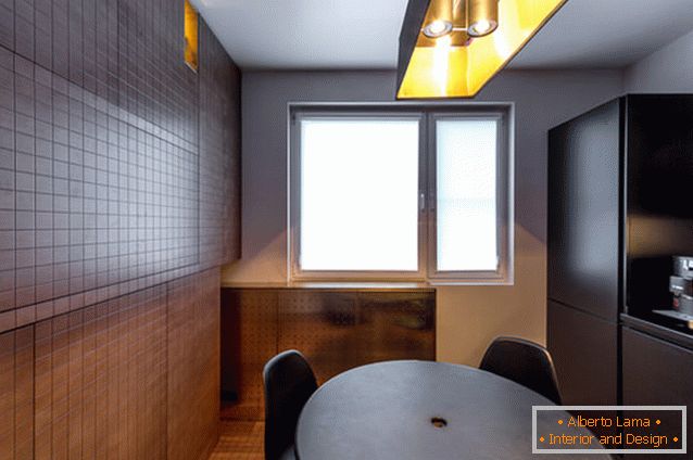 Interior corner kitchen in chocolate-golden hues