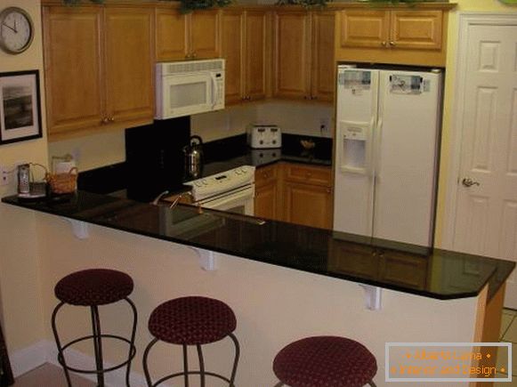 Bar counter between kitchen and living room - corner kitchen photo