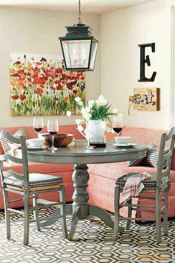 small pink corner sofa in the kitchen