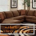 Brown sofa in combination with beige walls
