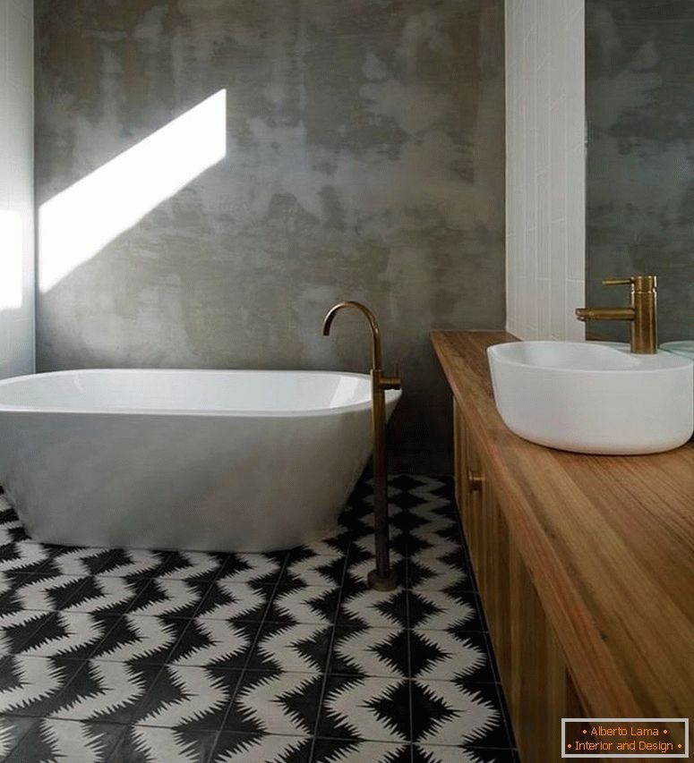 rendered-concrete-walls-of-the-bathroom-stand-in-contrast-to-the-geometric-cement-tiles
