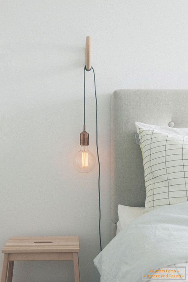 A light bulb near the bed
