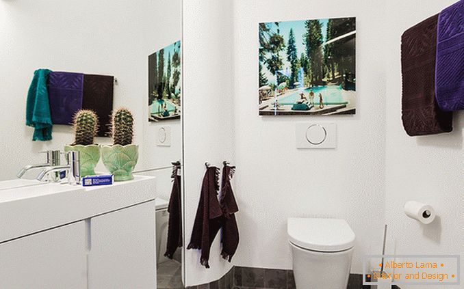 Bathroom in white color of a small studio apartment in Sweden