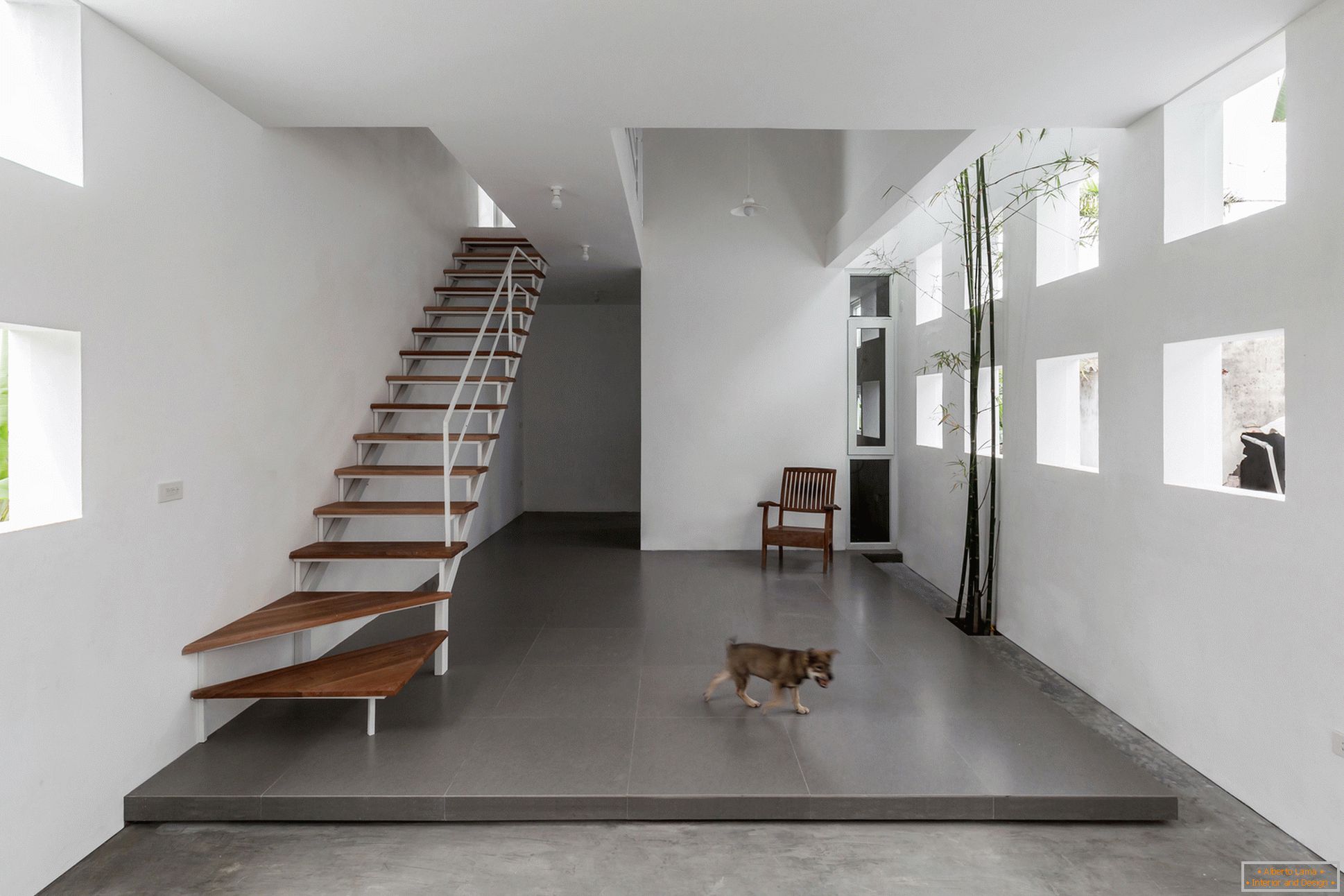 Staircase in a narrow concrete house