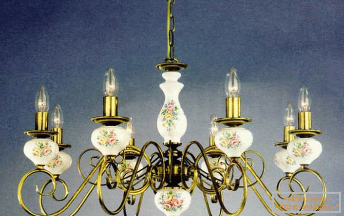 Chandelier with imitation candles is decorated with flower patterns in accordance with the requirements of country style.