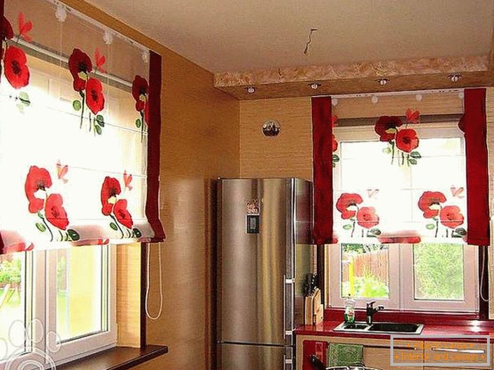 A cheerful kitchen with translucent curtains with bright red flowers.