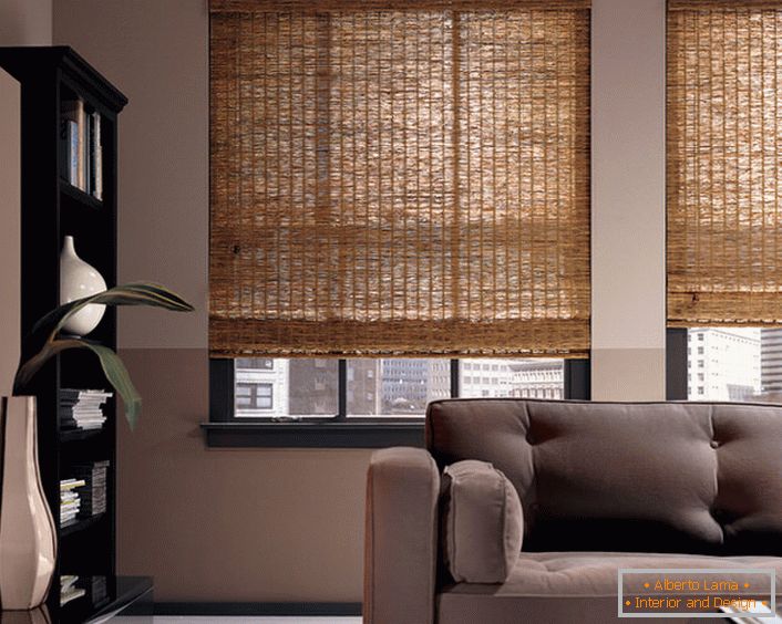 Lifting curtains made of bamboo - a non-standard version of the interior design of a modern spacious living room or office.