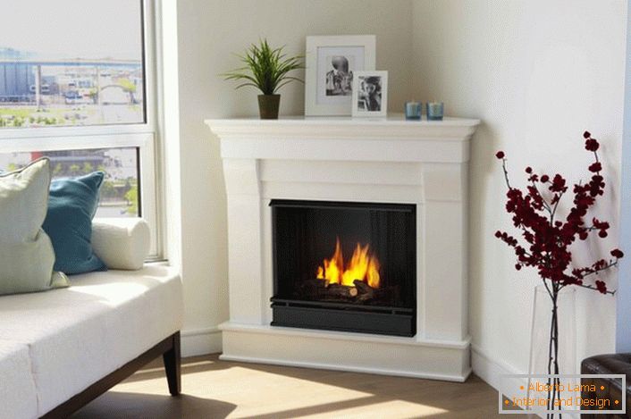 A cozy, unpretentious fireplace made of marble on biofuel.