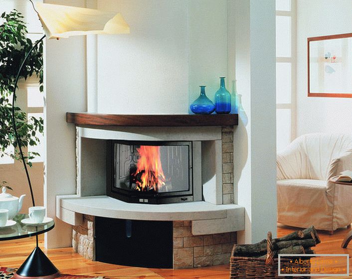 To the fireplace did not stand alone in the center of the living room you can put corner walls and the whole design will harmoniously fit into the interior design.
