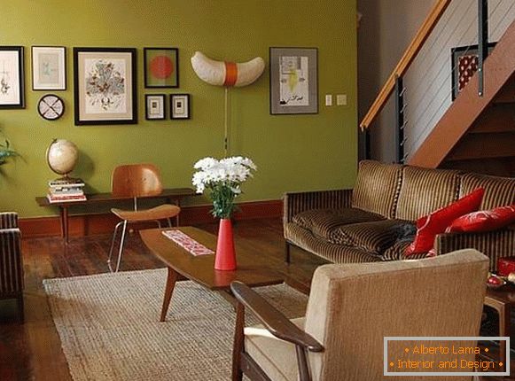 Green wallpaper and brown furniture in the interior
