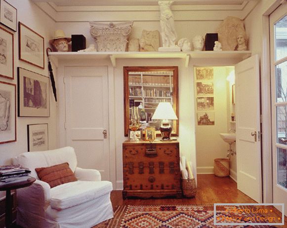 Sculptures on the shelf in the study