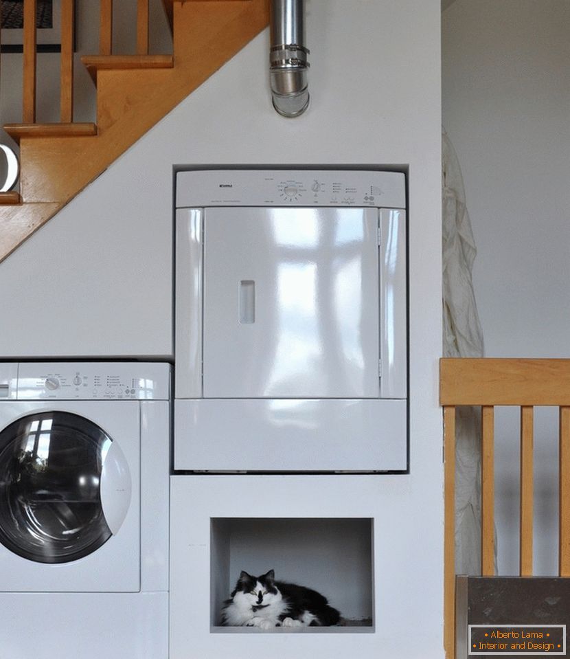 Built-in appliances under the stairs