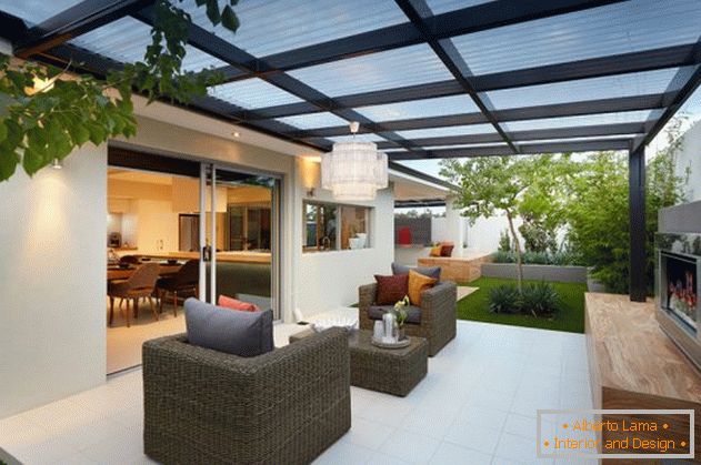 Polycarbonate porch attached to the house