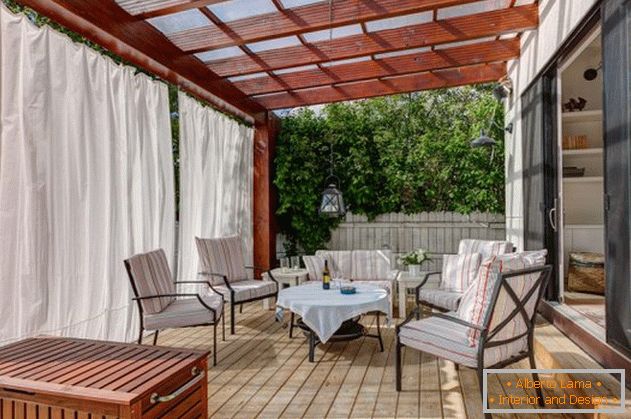 Chic polycarbonate porch attached to the house