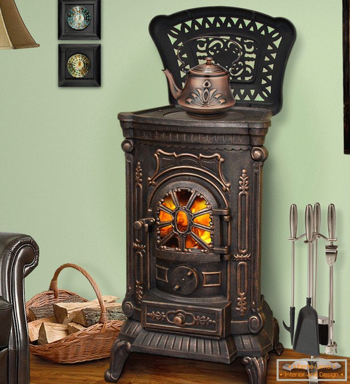 Decorative fireplace with cast iron furnace-decoration of the living room.
