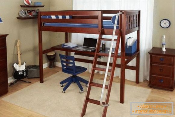 A stylish loft bed with a working area made of wood