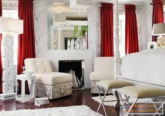 White living room with red curtains