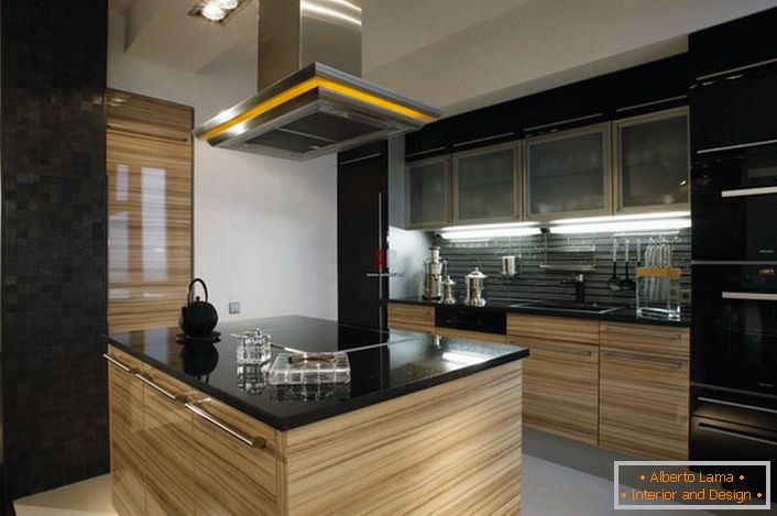 Kitchens in the style of minimalism are attractive with proper planning. A distinctive feature of the style is the placement of the working surface of the kitchen in the center of the room.
