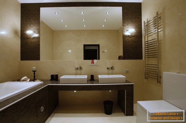 The bathroom in the minimalist style is decorated in light beige and brown tones. 
