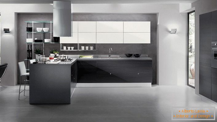 Spacious kitchen in a large country house in high-tech style. 