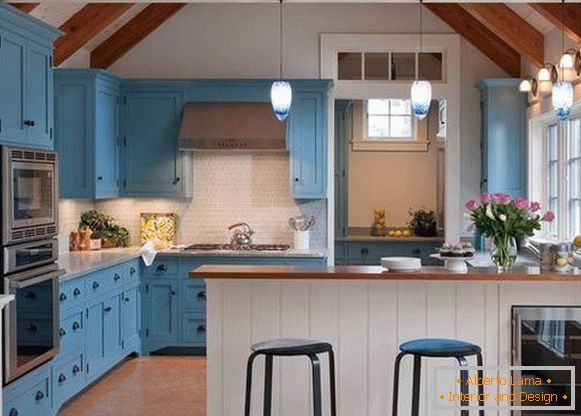 Stylish blue kitchen in the interior