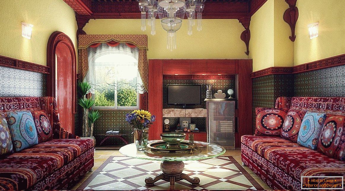 Table with a glass cover near the sofa