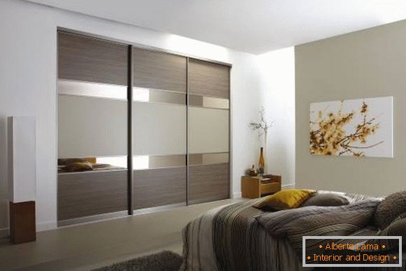 Fashionable wardrobe built into the bedroom wall