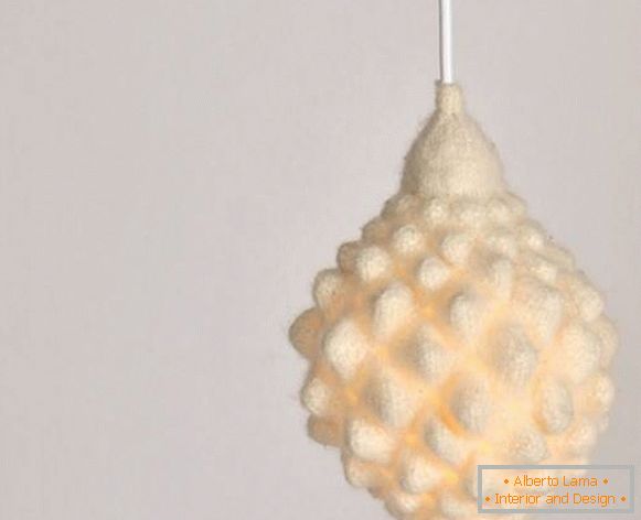 Knitted cover for a lamp