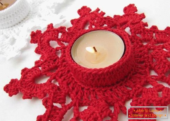 Knitted candlestick in the form of a snowflake