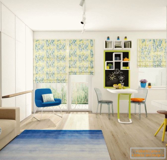 Interior of a small studio apartment with bright accents