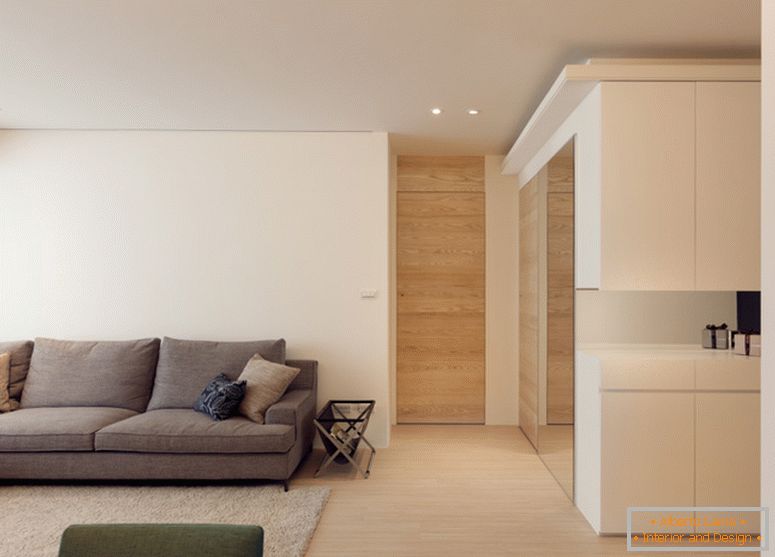 Large sofa in the interior of a three-room apartment