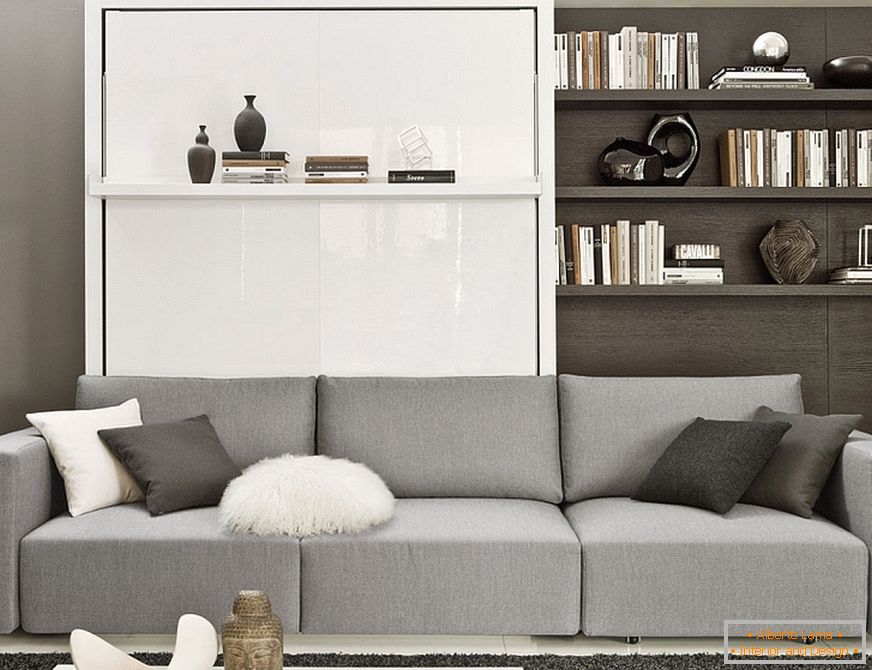 Folding sofa in the interior of the living room