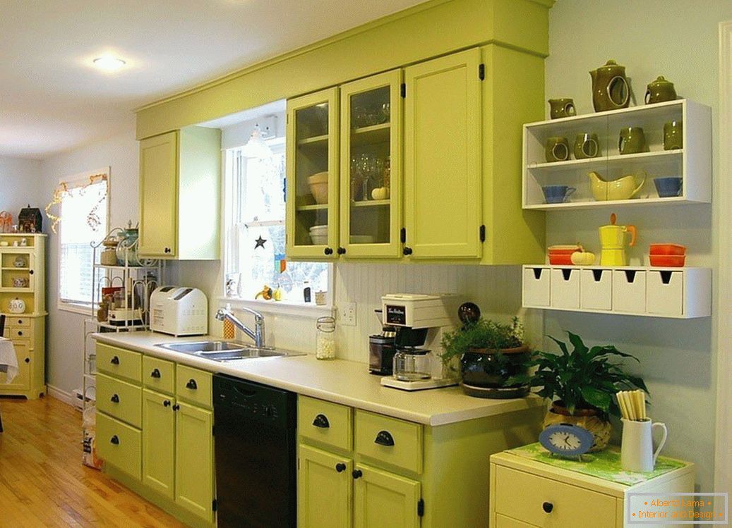 White walls and light green kitchen