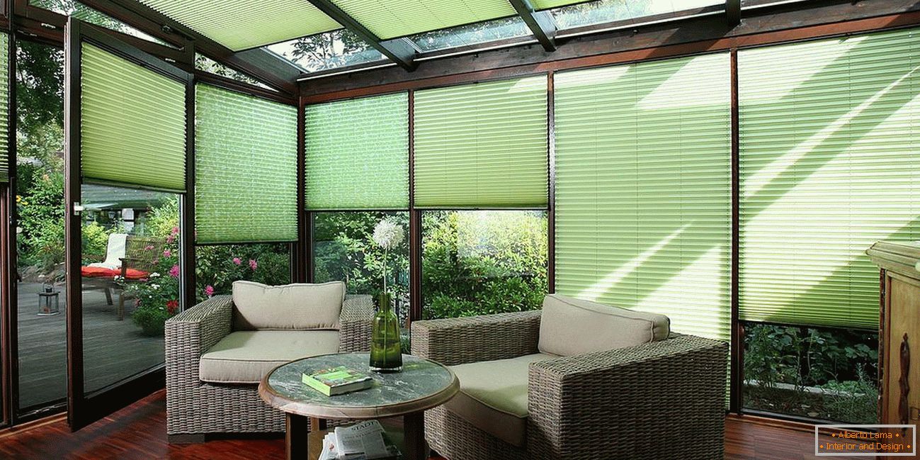 Green curtains on the veranda