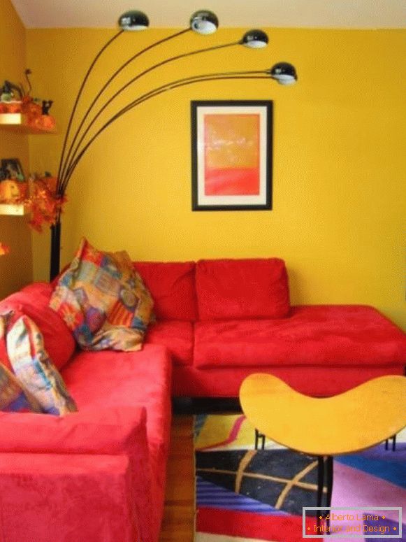 Red sofa in the yellow living room