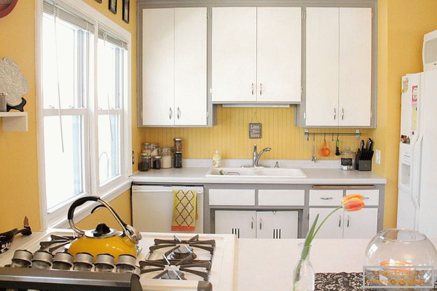 Dark yellow interior color of the kitchen